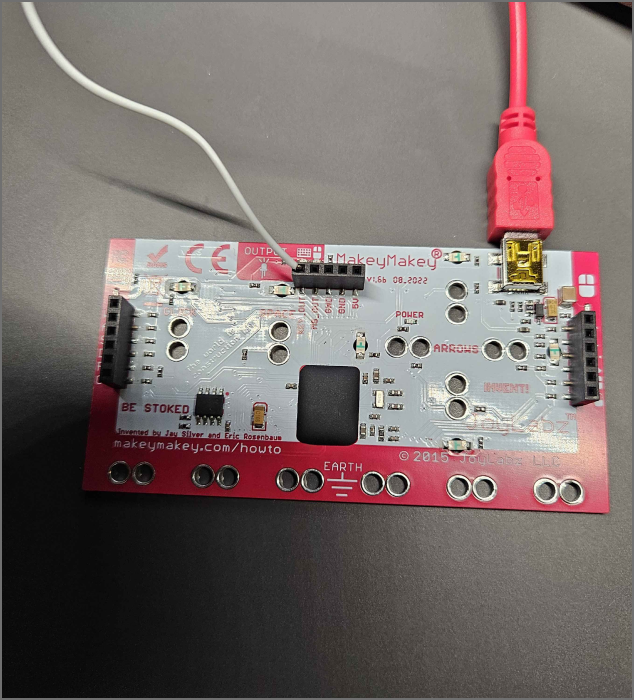 using the LED slots of the makey makey to power the LED light