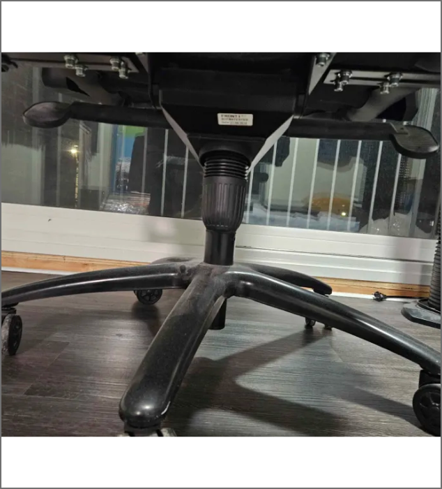 a chair closer look up of the gas lift 