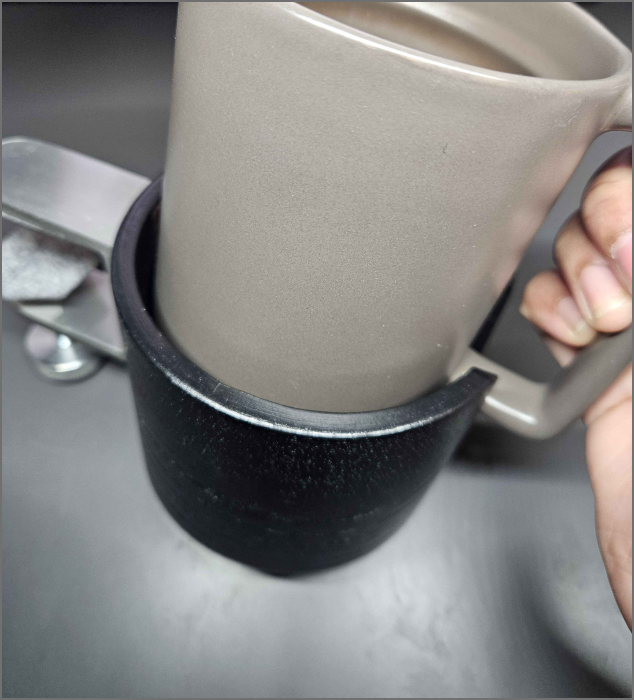 the interaction of the cup holder when about to be placed down