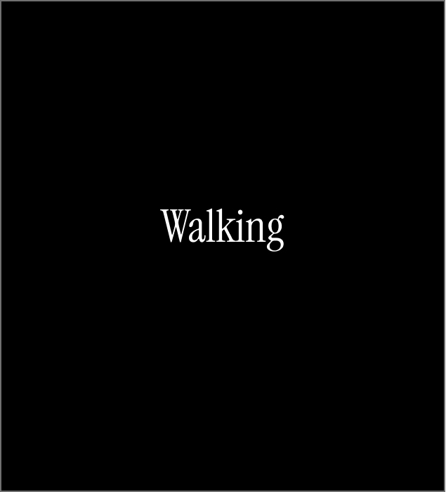 a singular student walking